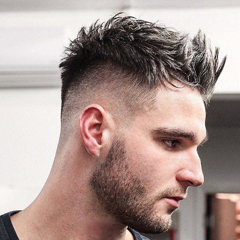 A man with a Short Spiky Haircut  