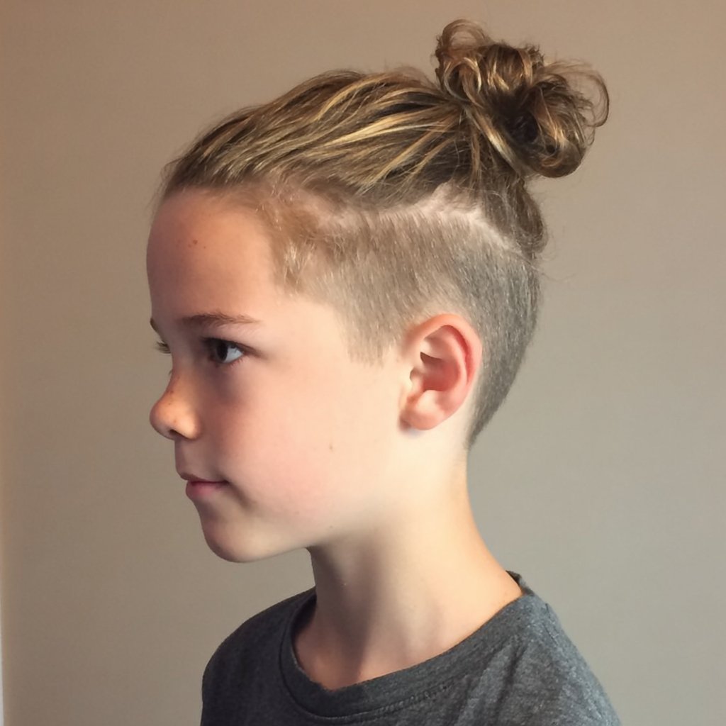 a kid with a bun hairstyle
