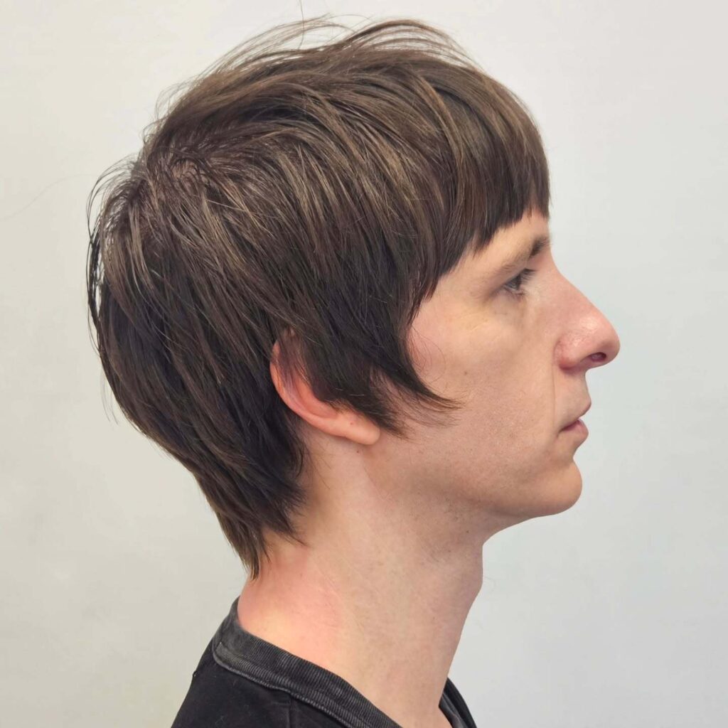 A guy with 1960s Classic British Hairstyle