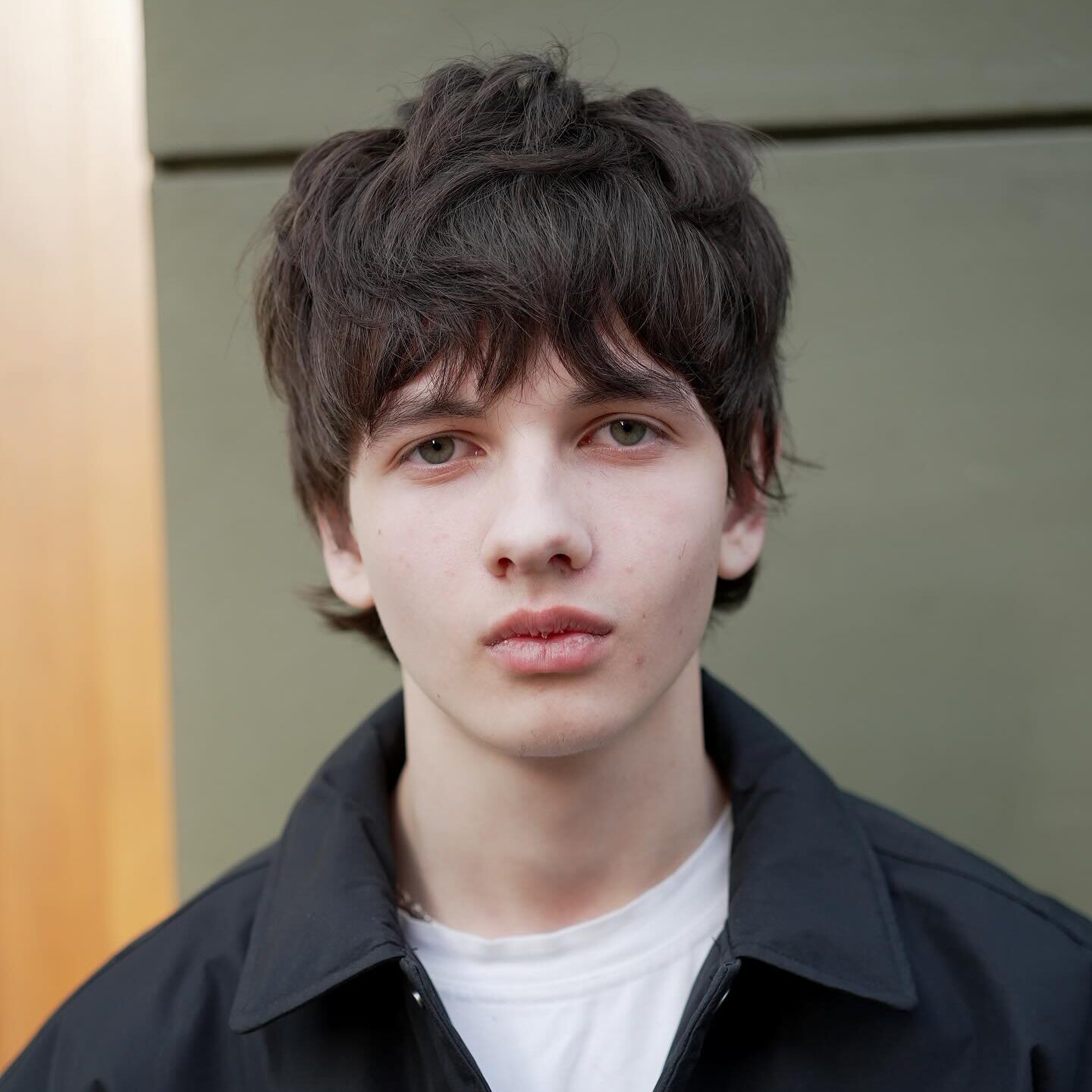 a guy with mid length mod haircut