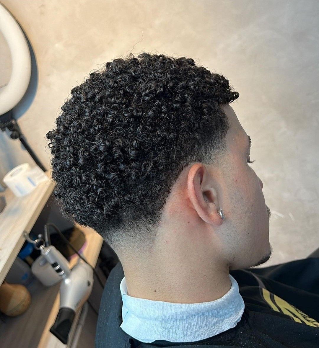 low taper with short afro hair