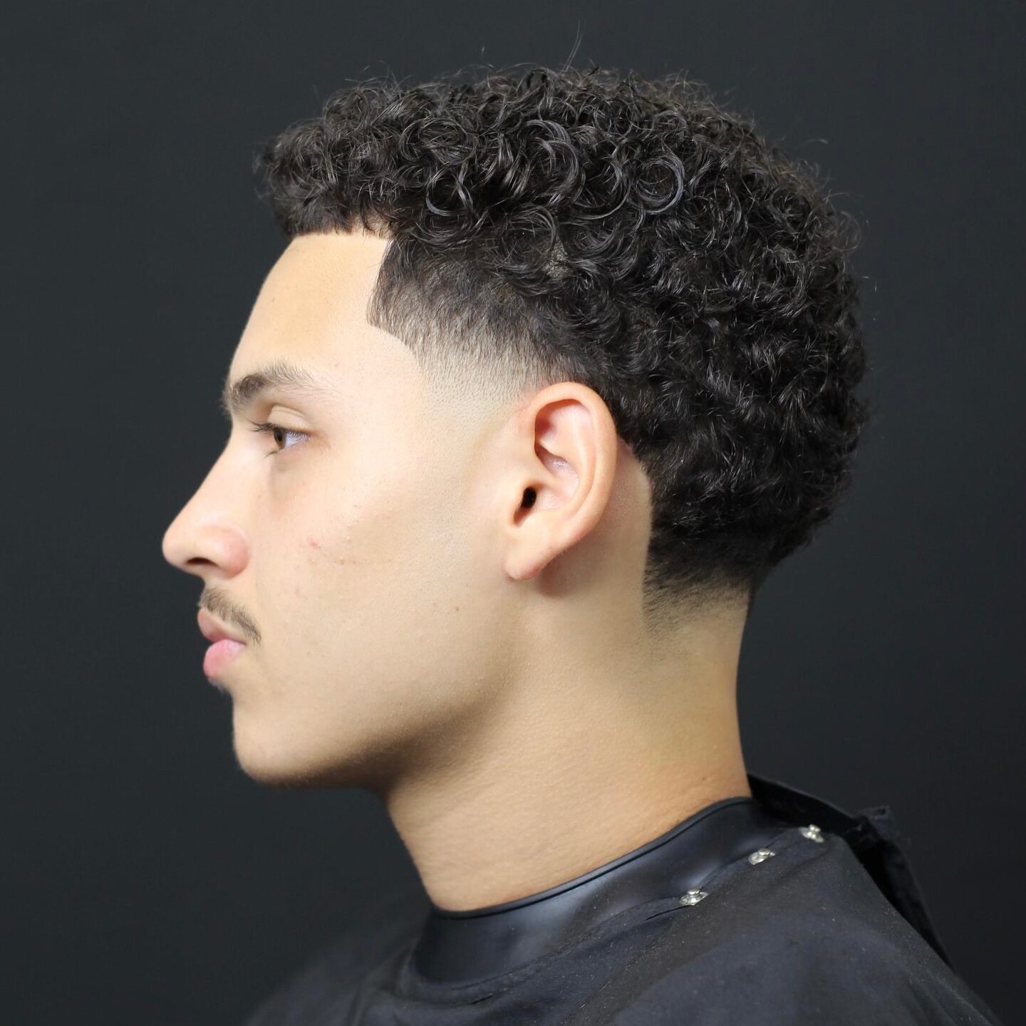 afro texture with mid taper