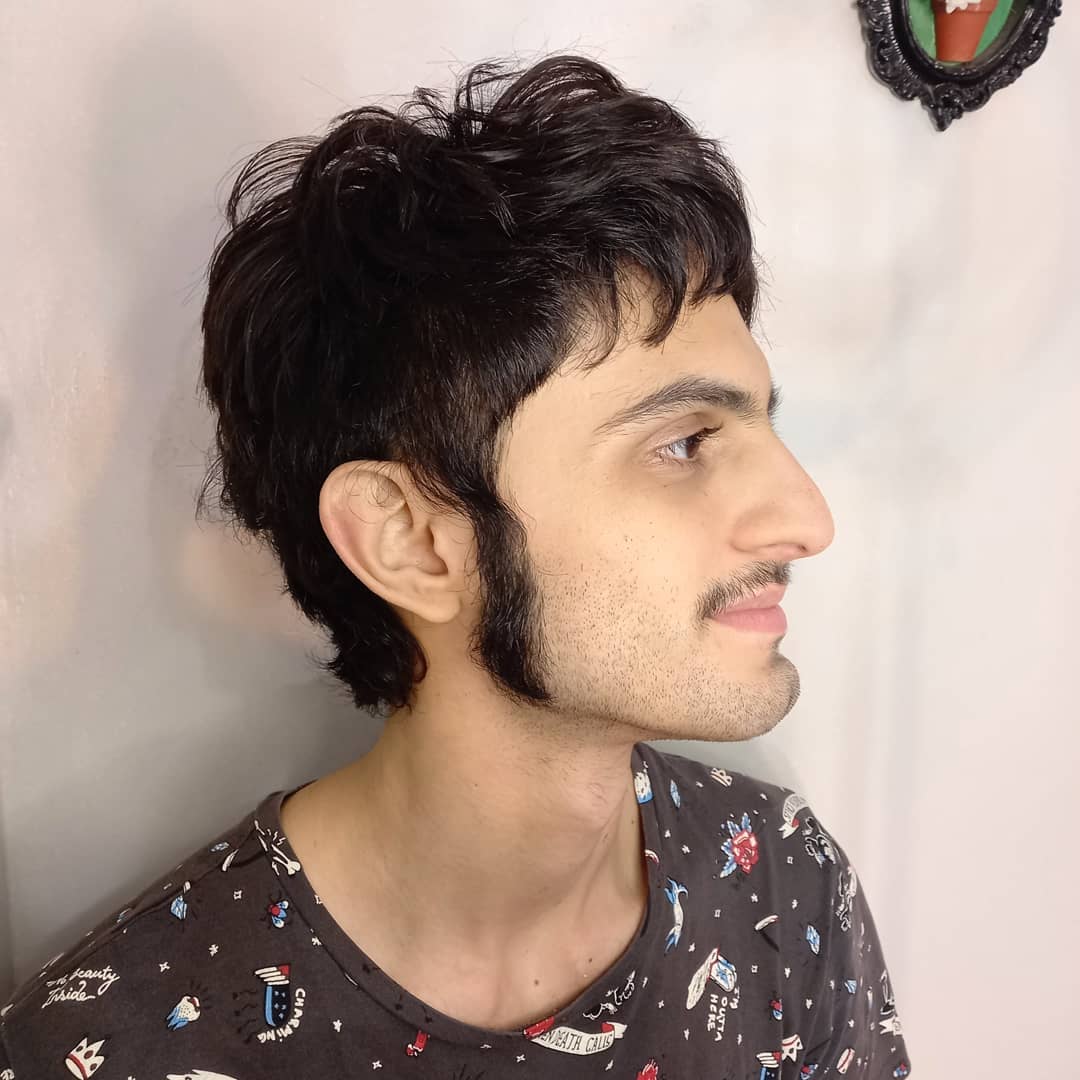 mod haircut with sideburns