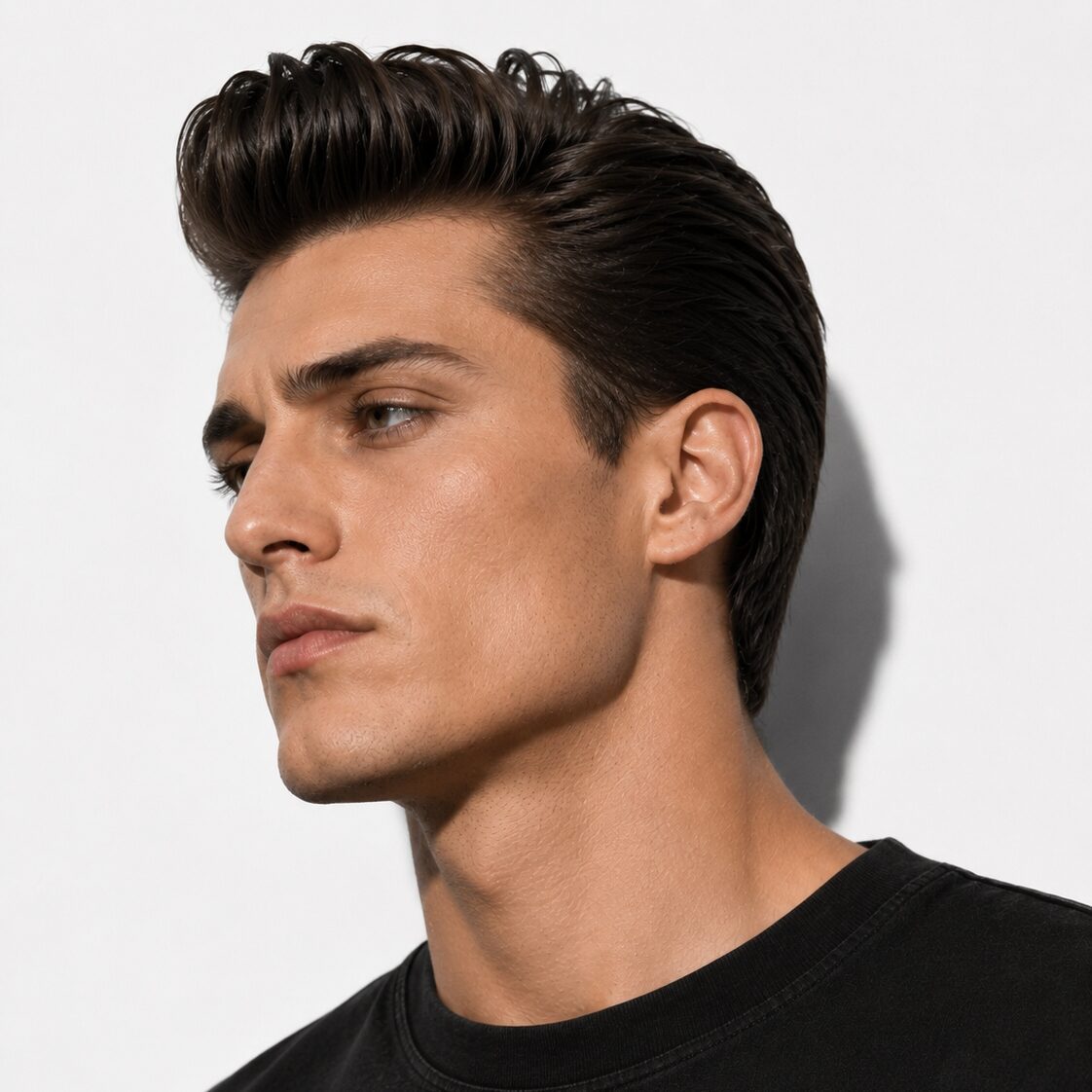 Classic modern pompadour hairstyle, swept back volume, clean contemporary cut side profile